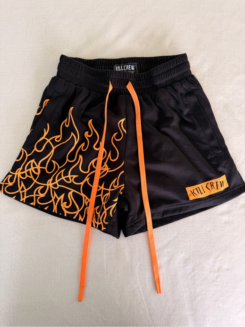 KILL CREW MUAY THAI FLAME SHORTS (MID THIGH CUT) - BLACK / NEON ORANGE